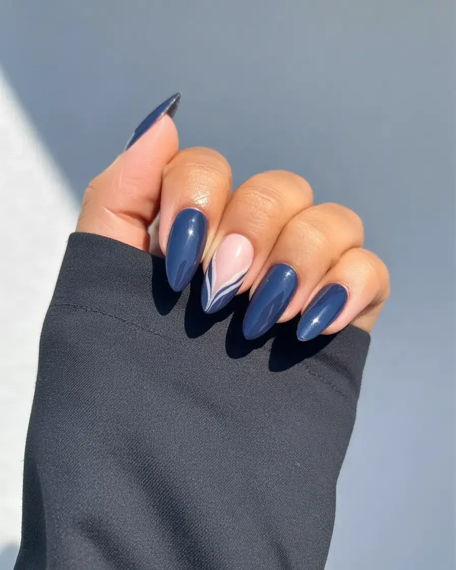 dark spring nail colors 2026 Blue Tones With a Soft Swirl