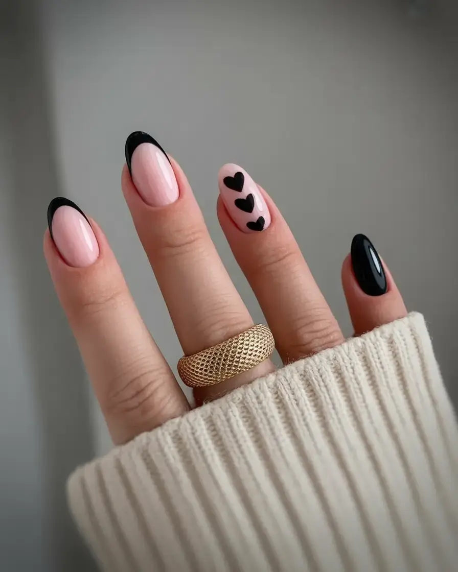 dark spring nail colors 2026 Black French With a Heartbeat