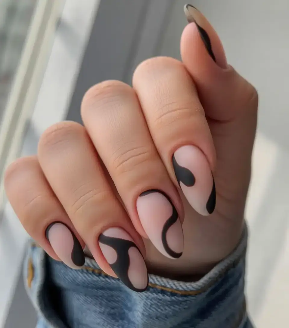 dark spring nail colors 2026 Abstract Noir Meets Soft Nude