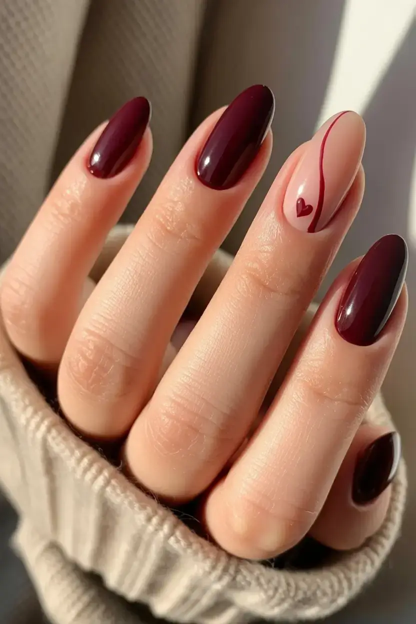 dark spring nail colors 2026 Wine Crush With a Tiny Heart