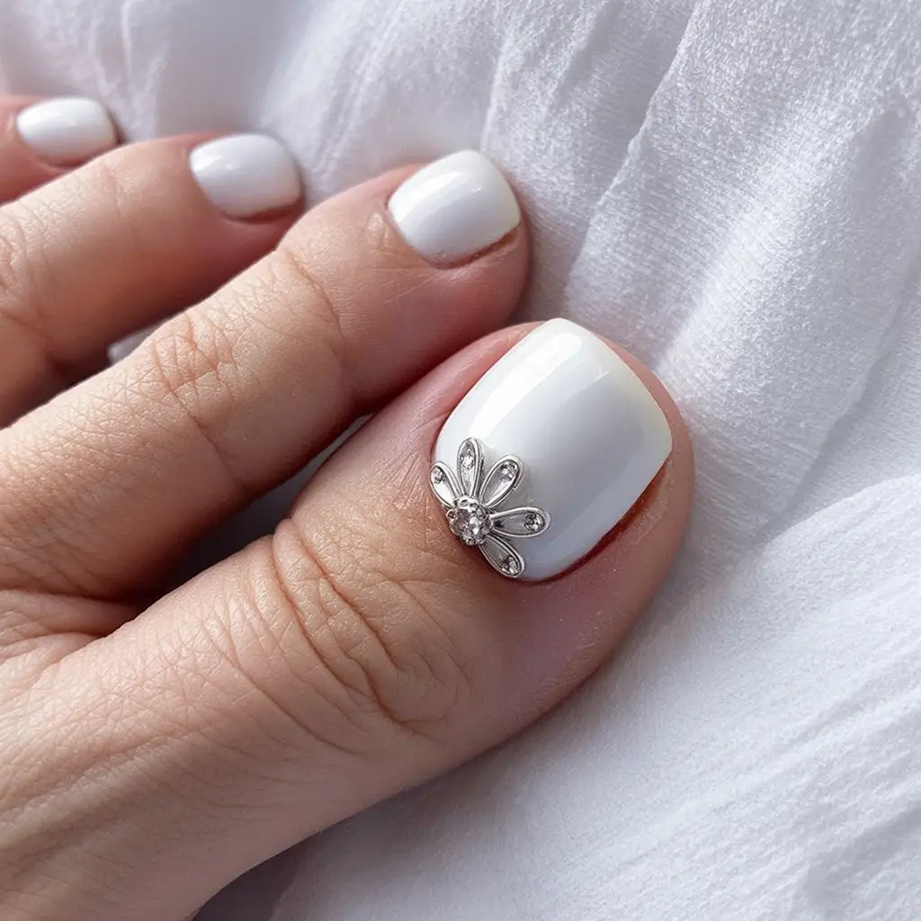 delicate spring toe nails 2026 Pure White Shine With a Crystal Petal Accent
