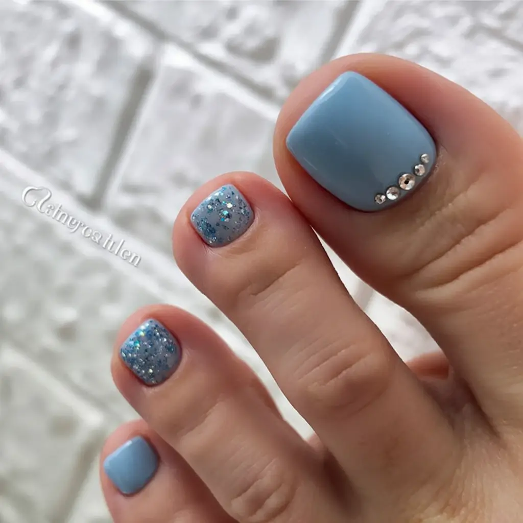 delicate spring toe nails 2026 Soft Blue Sparkle With Delicate Rhinestone Detailing
