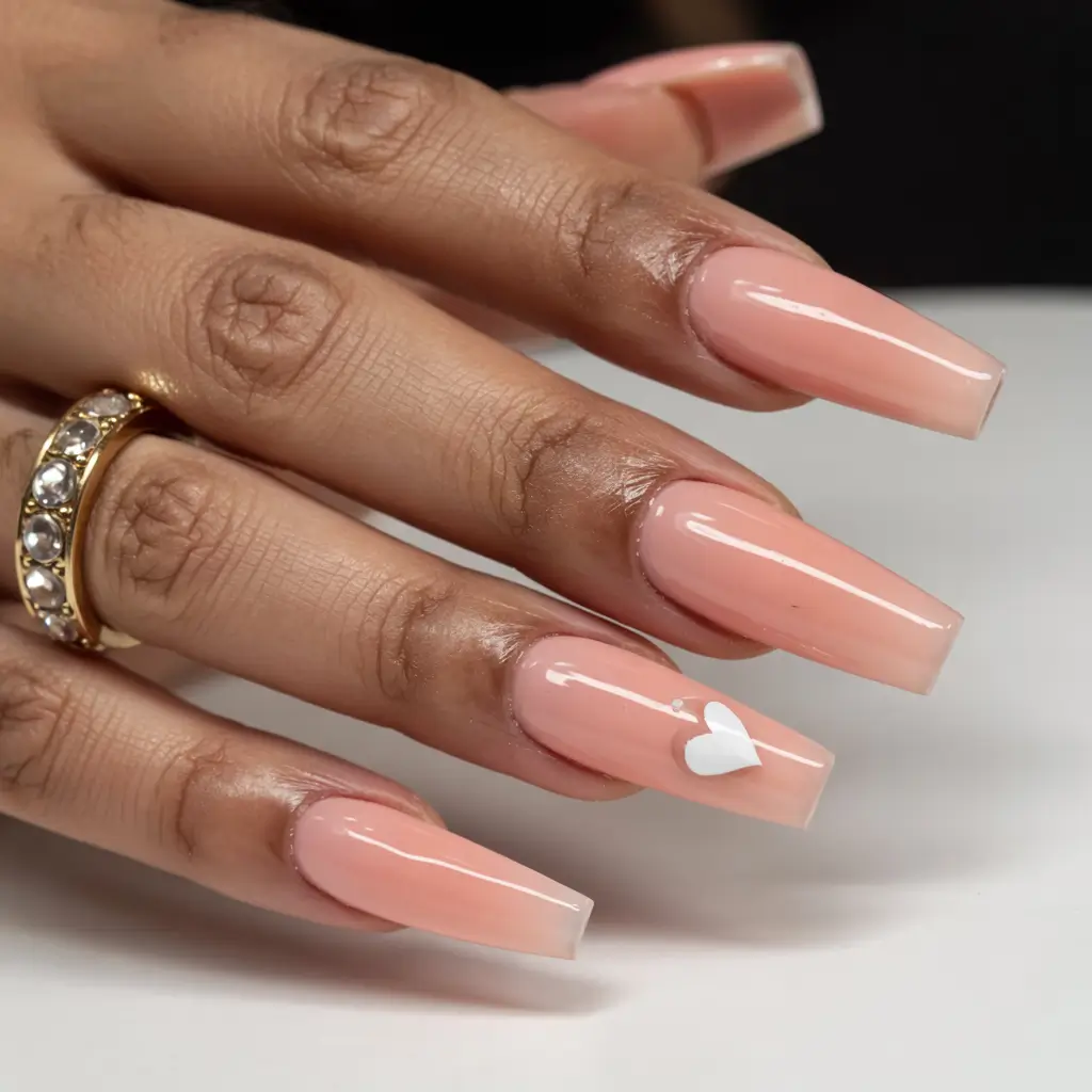 minimalist spring nails coffin 2026 Peach-Gloss Minimal Heart Accent