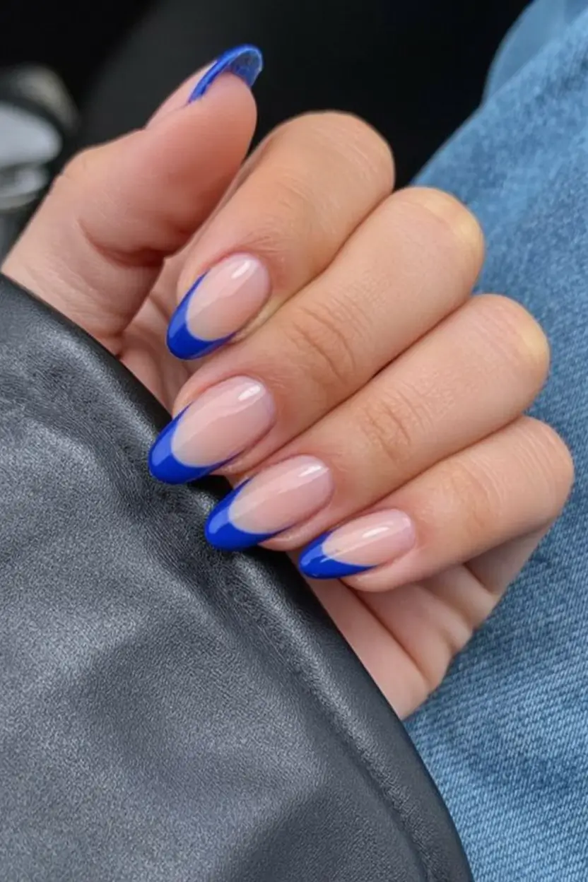 stylish blue spring nails for 2026 Blue-Tipped Almond French with a Modern Curve