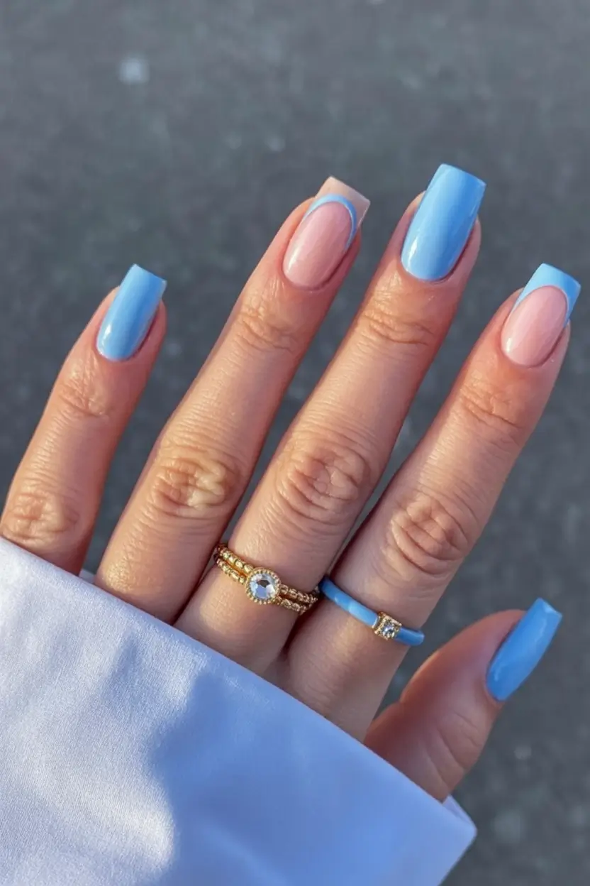 stylish blue spring nails for 2026 Square Blue Tips with Soft Nude Arcs