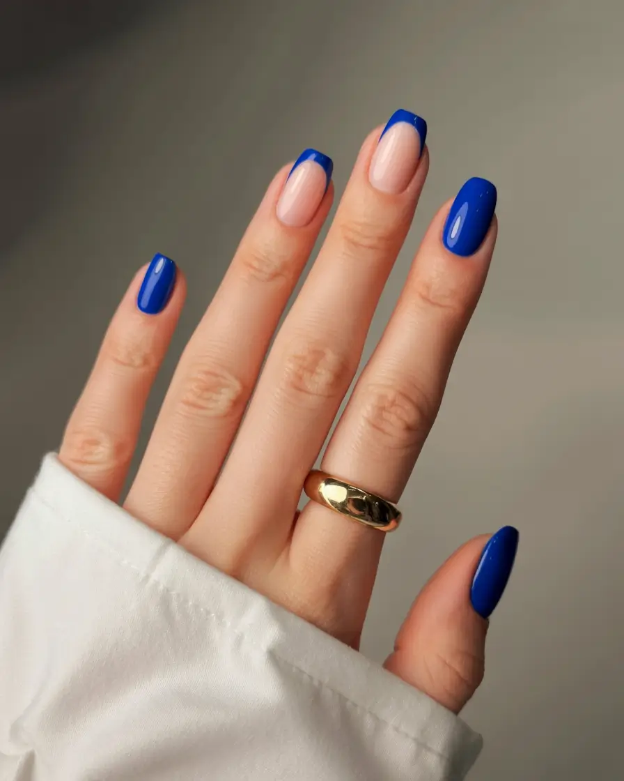 stylish blue spring nails for 2026 Bold Blue French Tips with Modern Contrast