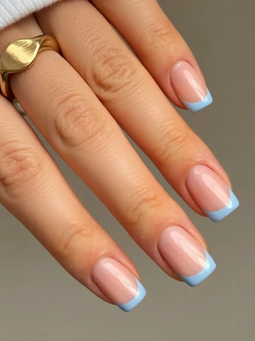 stylish blue spring nails for 2026 Minimal Blue French Tips with Soft Square Precision