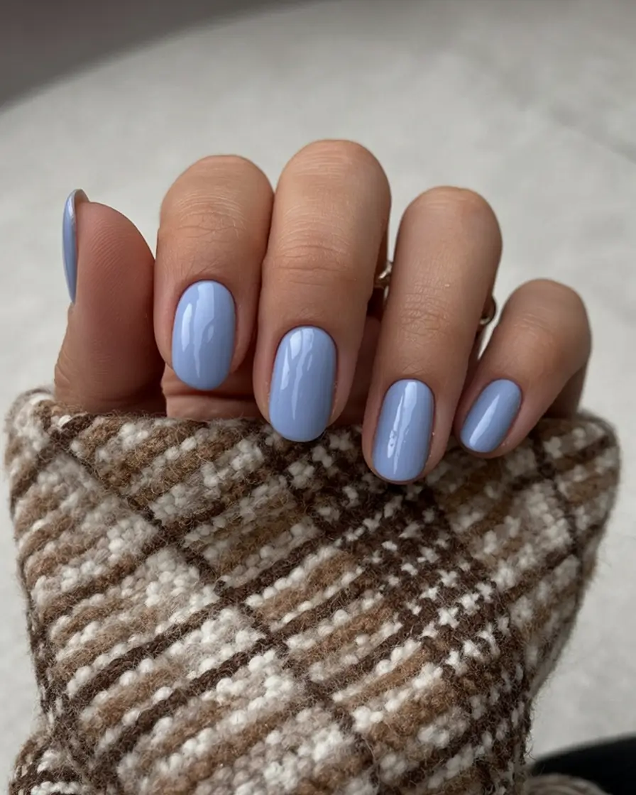 stylish blue spring nails for 2026 Soft Periwinkle Gloss for a Cozy–to–Spring Transition