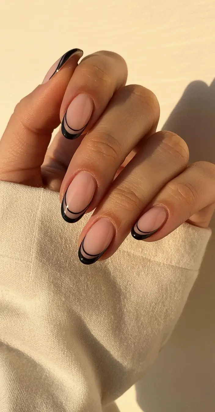 stylish minimalist spring nails 2026 Modern Black Halo French