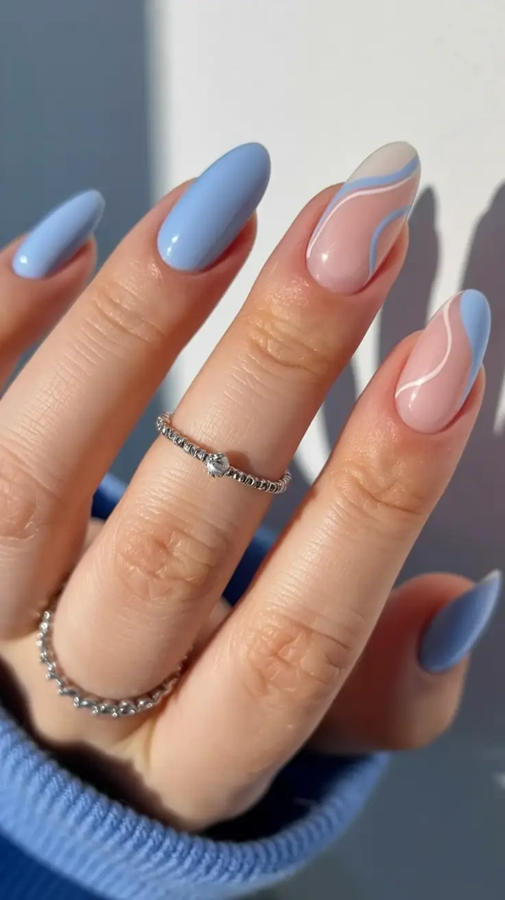 stylish minimalist spring nails 2026 Blue Skies & Minimalist Waves