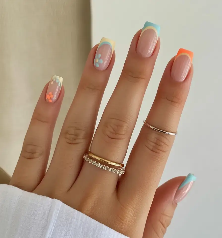 trendy nails for spring 2026 French Tips in Pastel Bloom