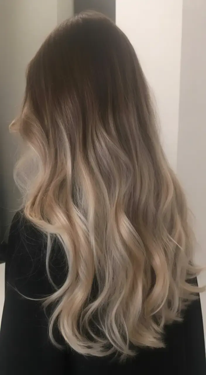 vibrant spring blonde hair color 2026 Smoky Blonde Melt with Soft Ends