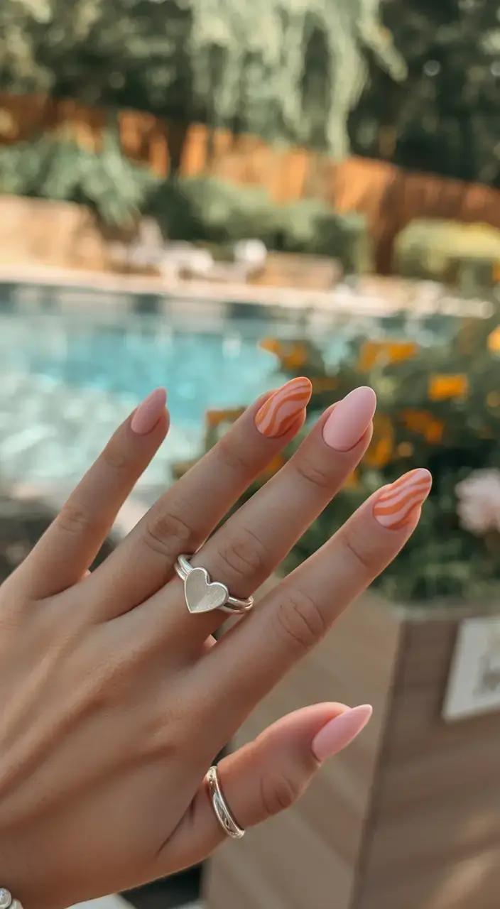 vibrant spring nail design 2026 Peach Fizz Swirls