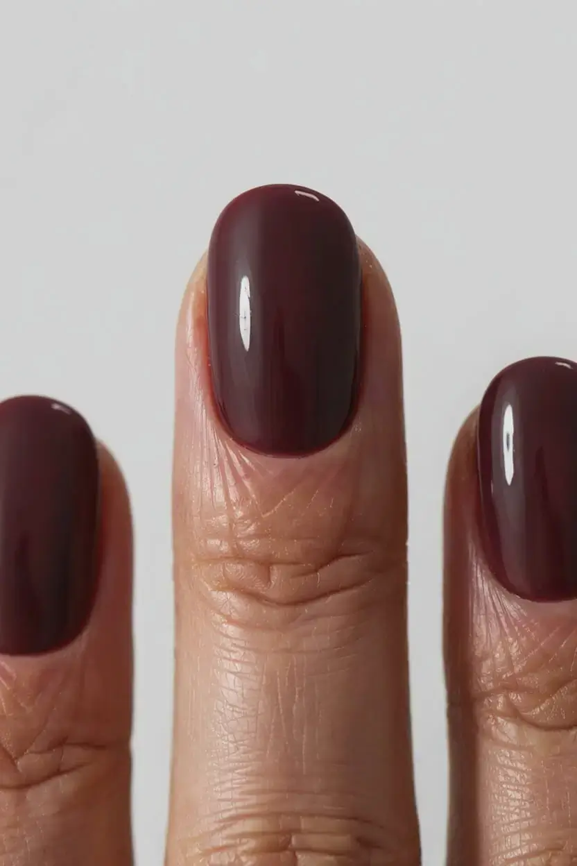 april nails colours spring 2026 Glossy Chocolate Burgundy Nails