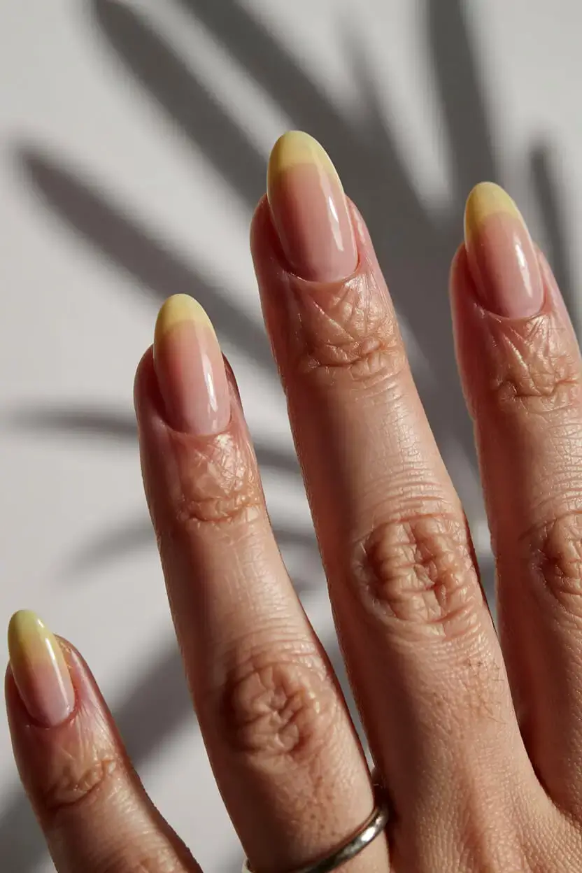 april nails colours spring 2026 Delicate Lemon French Tips for Spring Minimalism