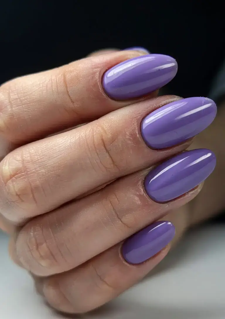 april nails colours spring 2026 Glossy Lilac Almond Nails