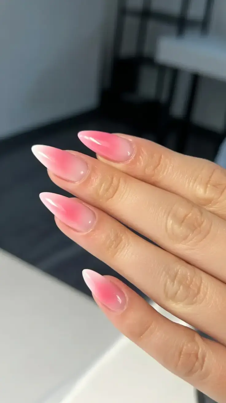beautiful spring aura nails 2026 Minimal Pink Aura Almond Nails with a Soft Glow