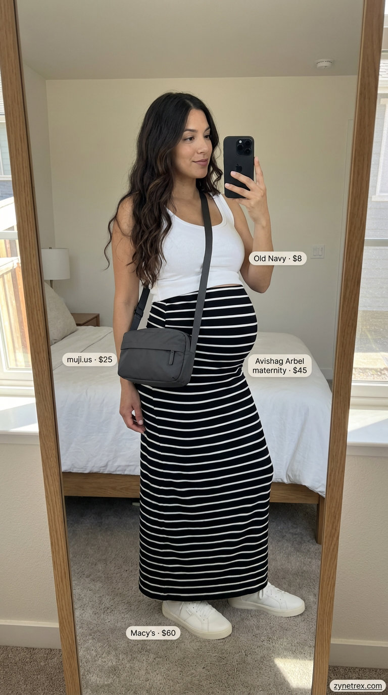 Sporty Striped Skirt: Casual Maternity Summer Outfits 2026 A sporty black and white striped maternity midi skirt with a black fitted tank top and white sneakers, styled for casual maternity summer outfits in 2026.