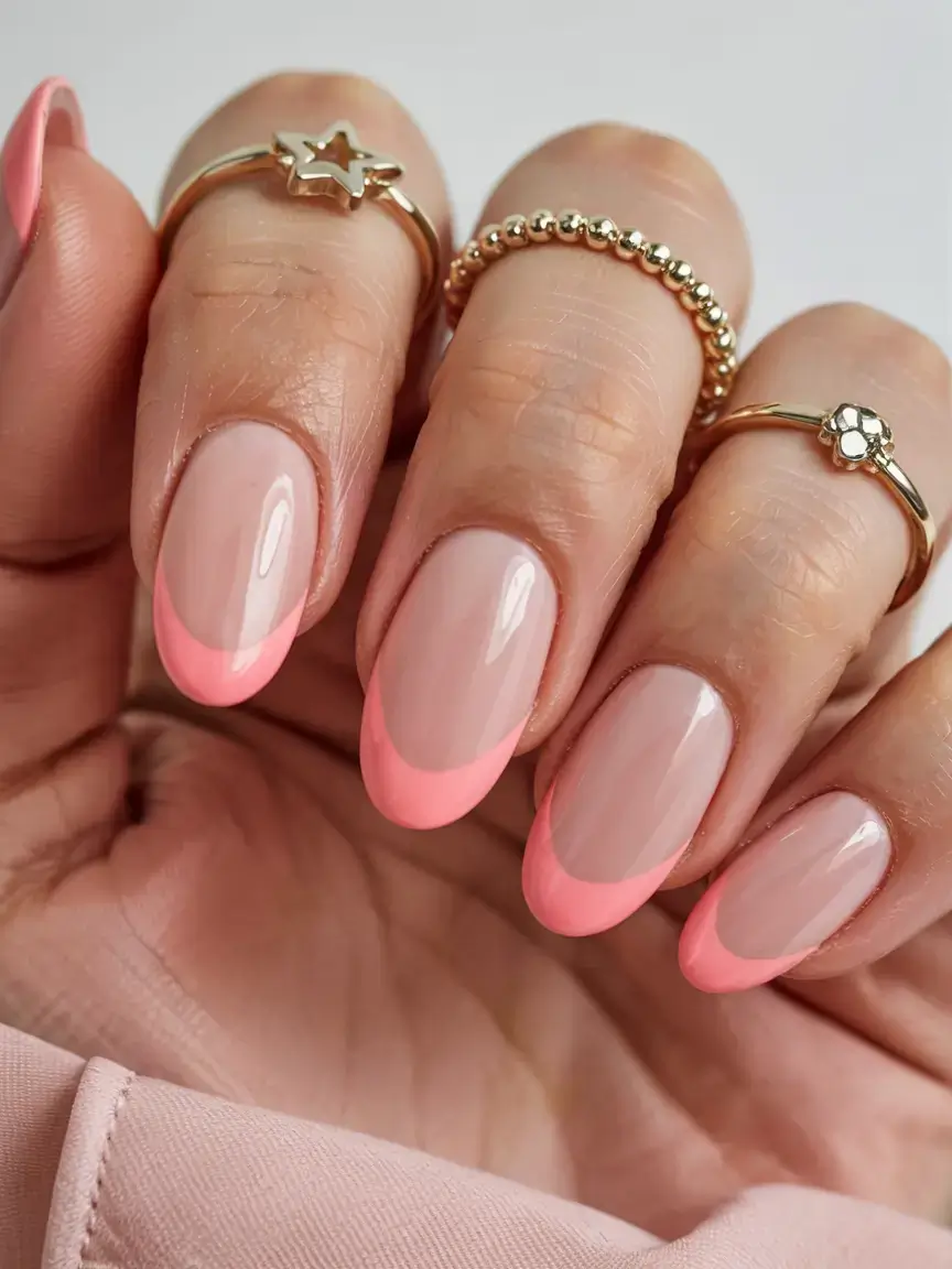 delicate spring oval nails 2026 Classic Coral French Tips for a Fresh Seasonal Finish