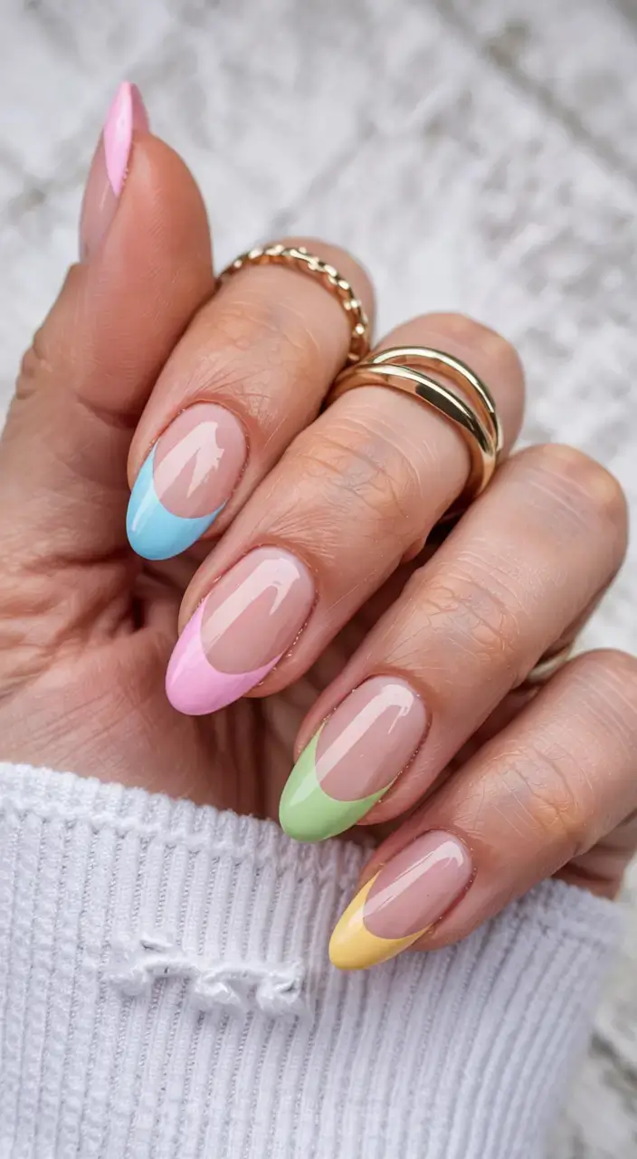 delicate spring oval nails 2026 Pastel Rainbow French Tips for a Cheerful Spring Finish