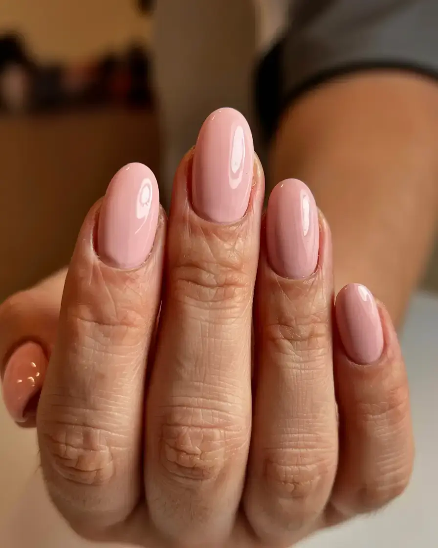 delicate spring oval nails 2026 Milky Pink Oval Nails with a Glossy Finish