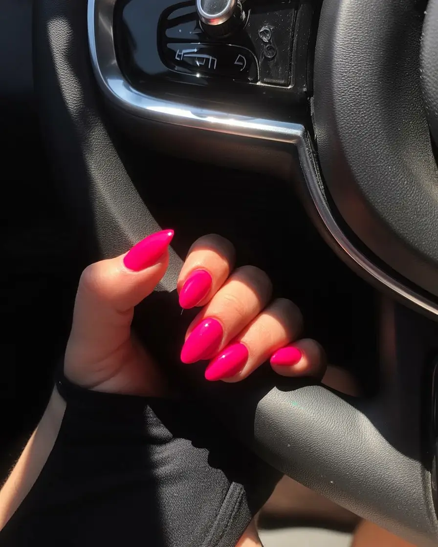 fresh spring hot pink nails 2026 Glossy Hot Pink Almond Nails for a Bold Spring Moment