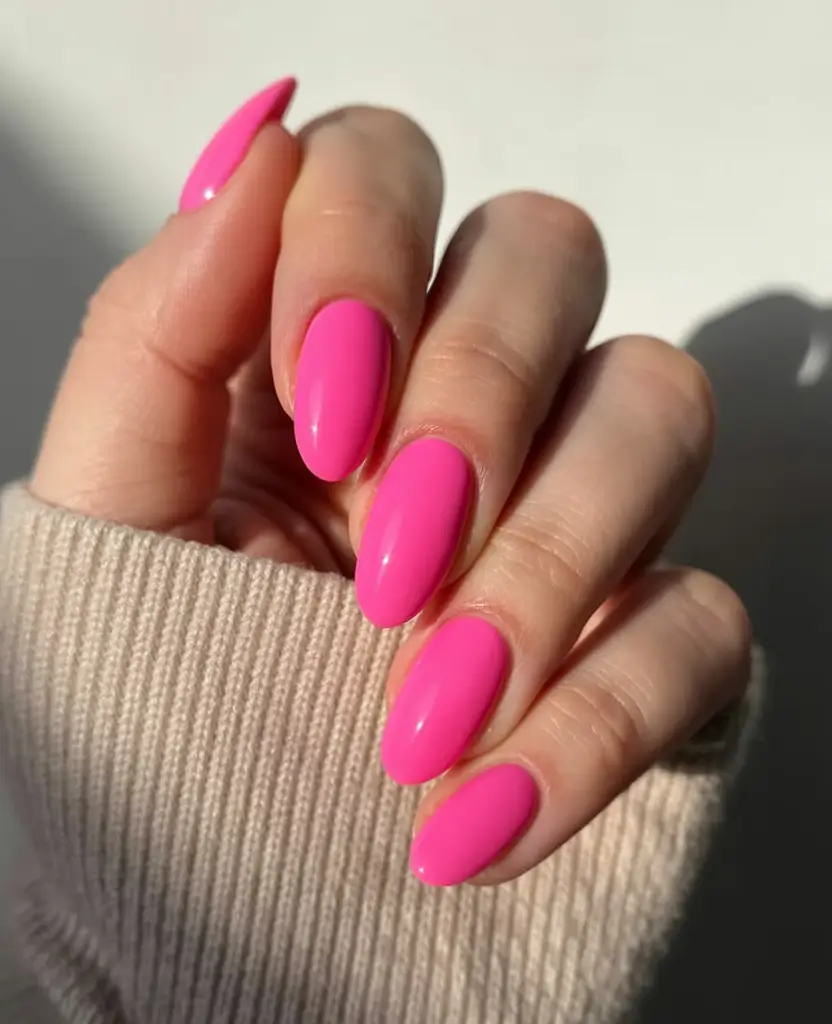fresh spring hot pink nails 2026 Classic Hot Pink Almond Nails With a Clean Glossy Finish