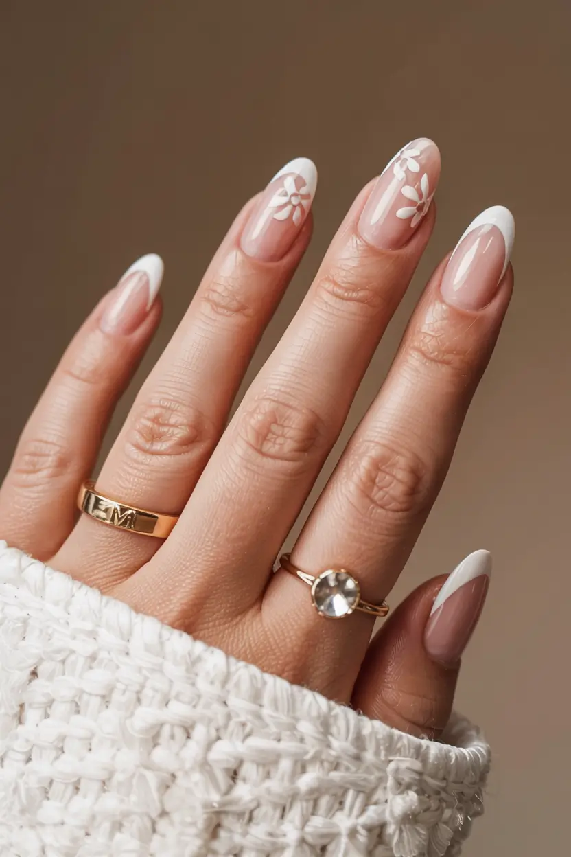 graduation nails ideas 2026 Modern French with Minimal Floral Accents