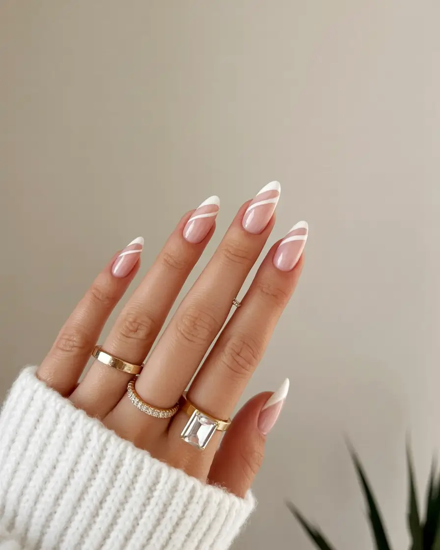 graduation nails ideas 2026 Modern French with Soft Diagonal Layers