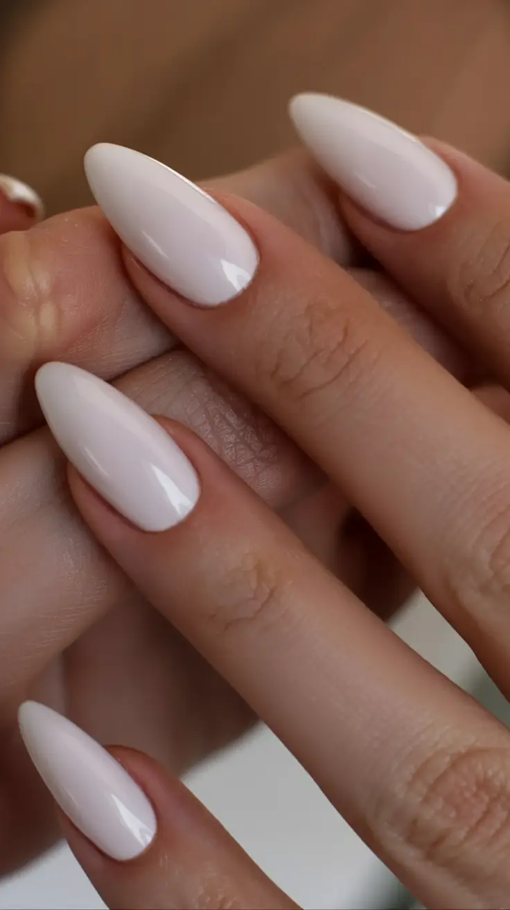 modern spring nails for brown skin 2026 Cloud White Almond Nails