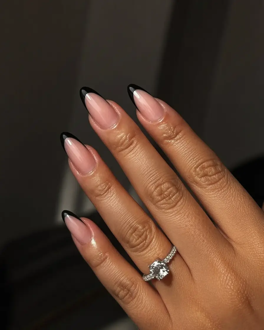 modern spring nails for brown skin 2026 Black French Tips
