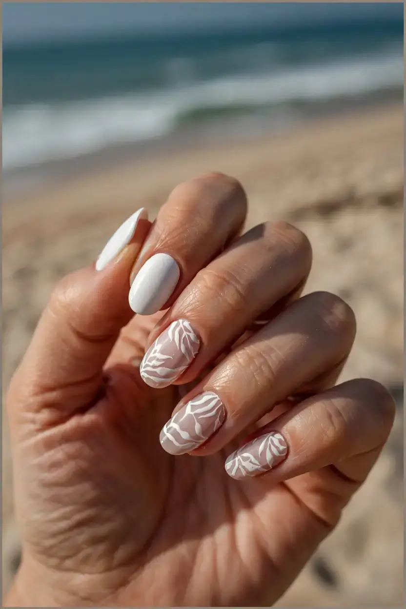 modern spring vacation nails 2026 Minimalist White Coastal Leaf Nails