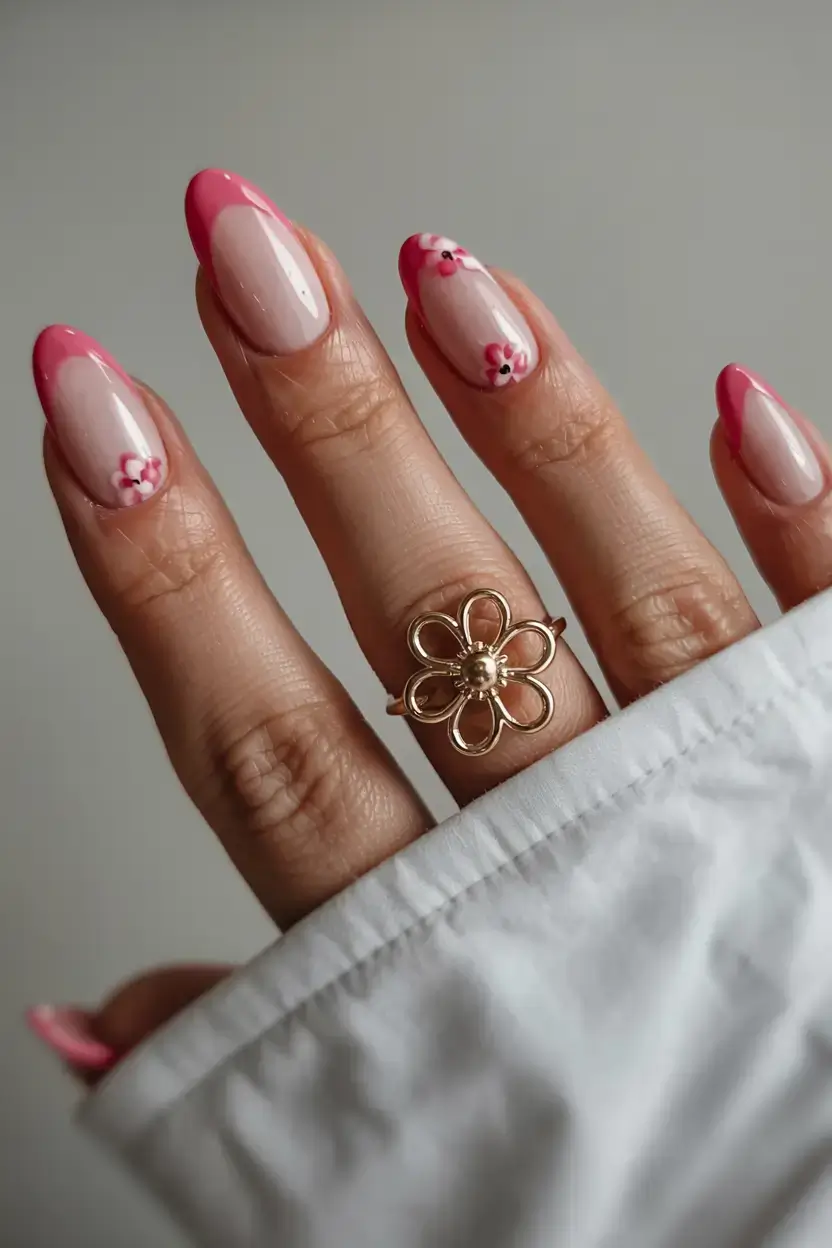 modern spring vacation nails 2026 Soft Pink French Tips with Tiny Blossoms