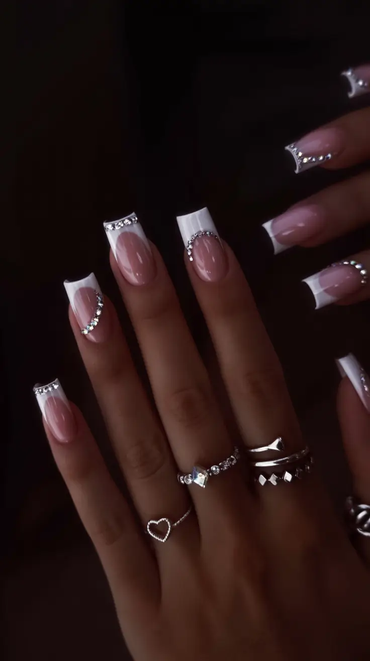 must try spring nails for dark skin 2026 Crystal French Tips with Glamorous Sparkle