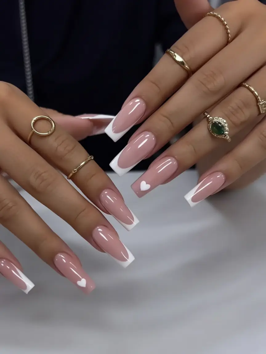must try spring nails for dark skin 2026 Long Glossy Square French Nails with Tiny Heart Details