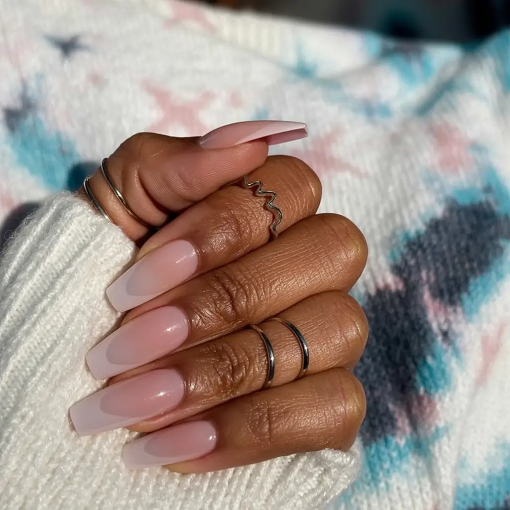 must try spring nails for dark skin 2026 Soft Nude Coffin Nails with Milky Finish