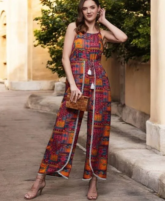 Wide-leg sleeveless jumpsuit with a vibrant abstract print and tie waist