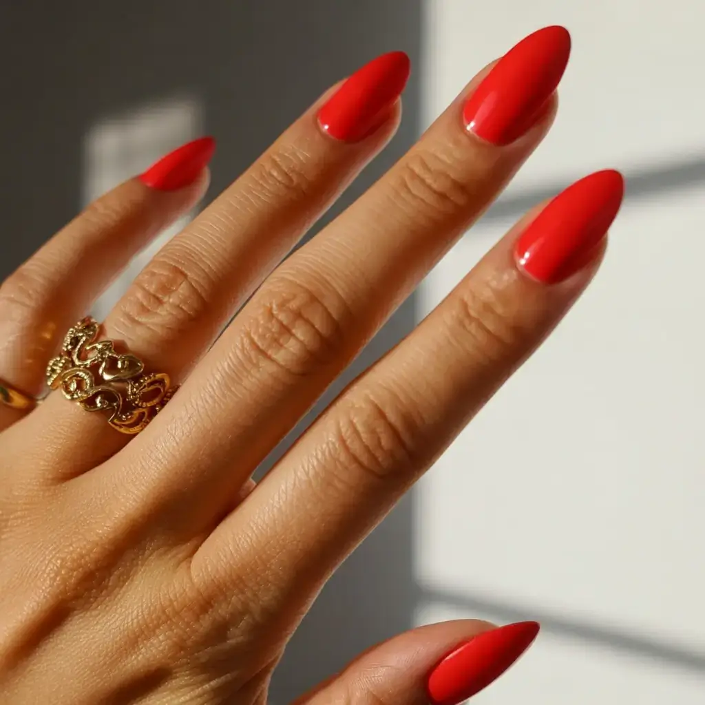 sophisticated spring long nails 2026 trends Classic Bold Red Almond Nails for Confident Spring Style