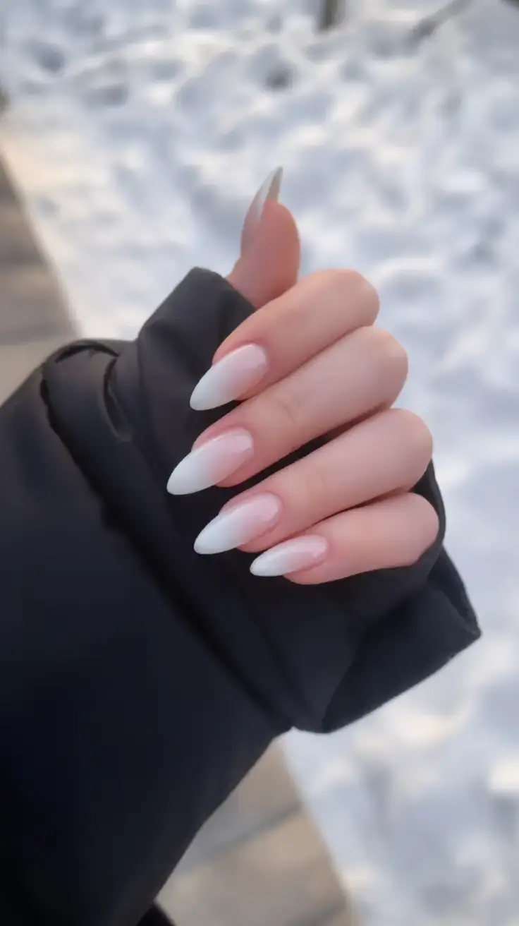 sophisticated spring long nails 2026 trends Milky White Ombre Almond Nails for Clean Spring Minimalism