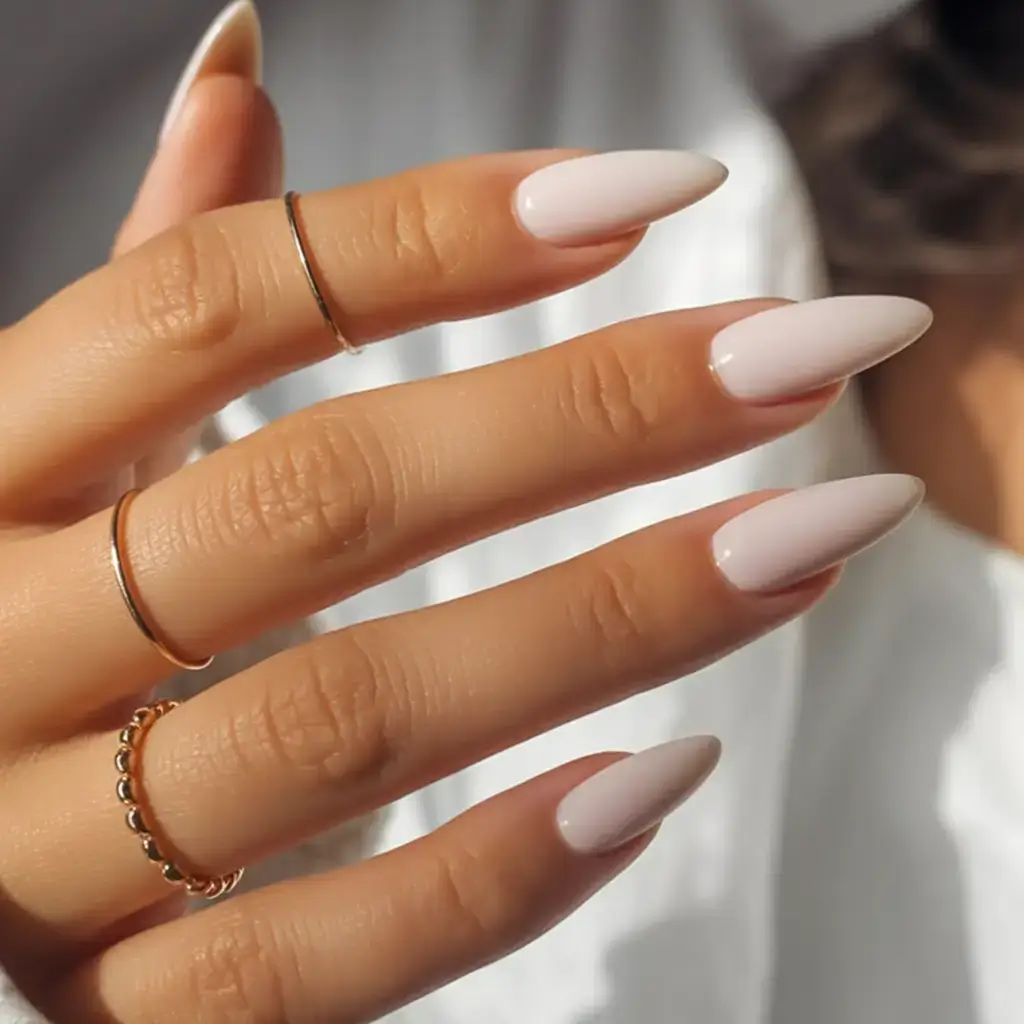 sophisticated spring long nails 2026 trends Soft Almond Cream Nails for Timeless Neutral Elegance