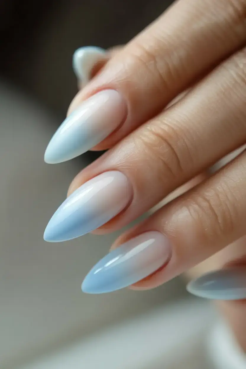 sophisticated spring long nails 2026 trends Baby Blue Ombré Almond Nails for Delicate Spring Beauty