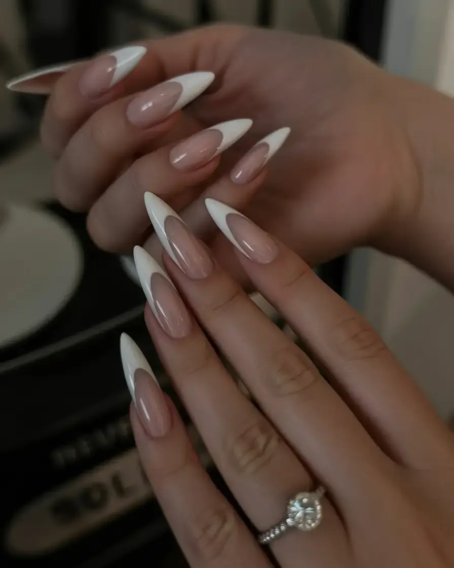 sophisticated spring long nails 2026 trends Modern Sharp French Tips for a High-Fashion Spring Look