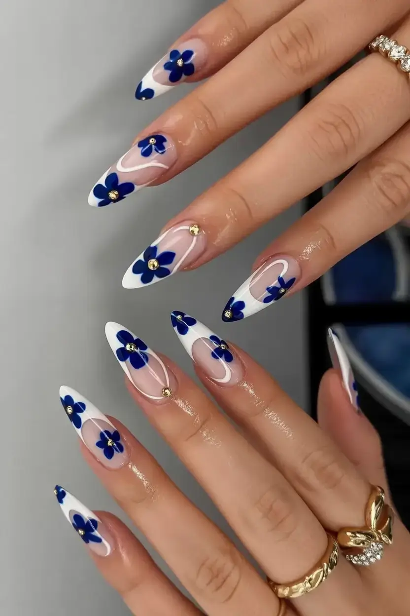 sophisticated spring long nails 2026 trends Blue Floral Art That Feels Like Spring in Bloom