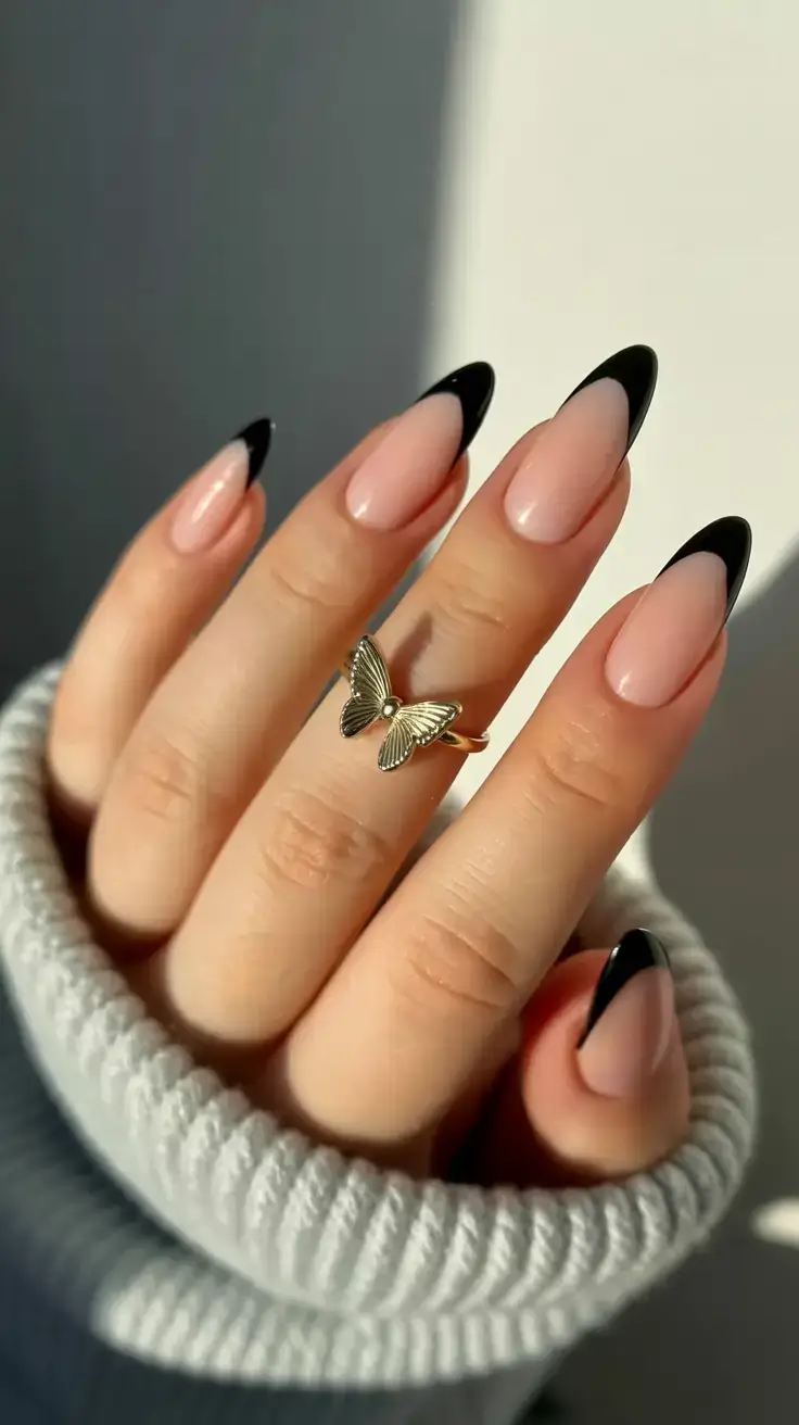 sophisticated spring long nails 2026 trends Black-Tipped French Almond Nails for a Chic Minimalist Spring