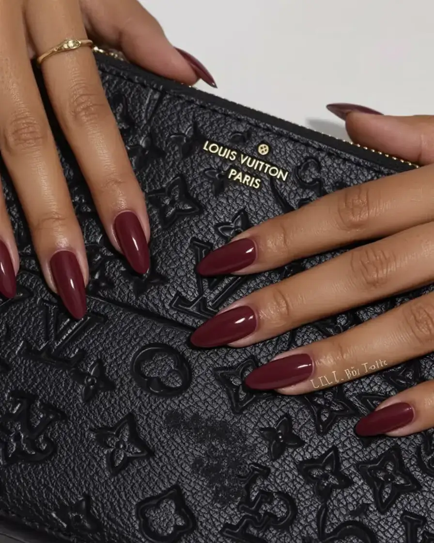 sophisticated spring long nails 2026 trends Luxury Burgundy Almond Nails with Timeless Depth