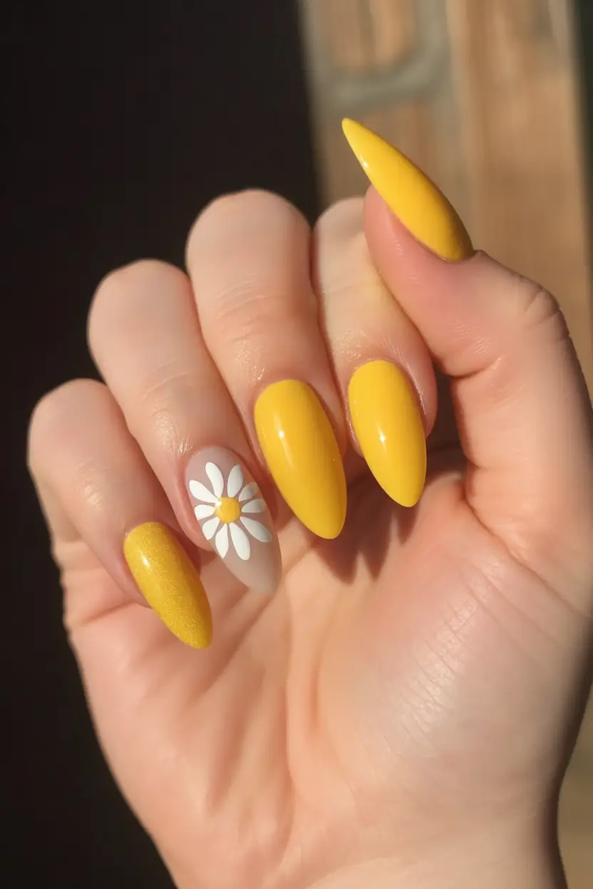 spring to summer season nail art ideas 2026 Sunny Daisy Accent on Glossy Lemon Almond Nails