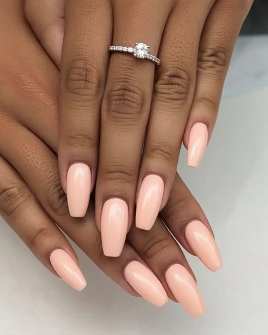 spring to summer season nails color ideas 2026 Glossy Nude Almond Nails That Work All Season