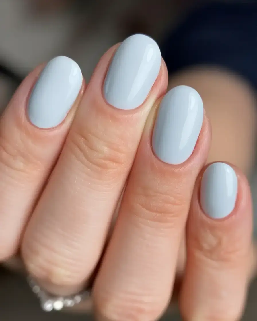 trendy spring nails 2026 for pale skin Soft Cloud Blue Short Nails