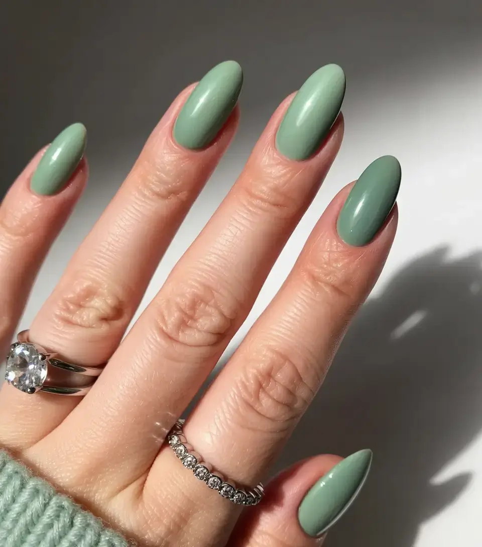 trendy spring nails 2026 for pale skin Muted Mint Almond Nails Fresh Botanical Tones
