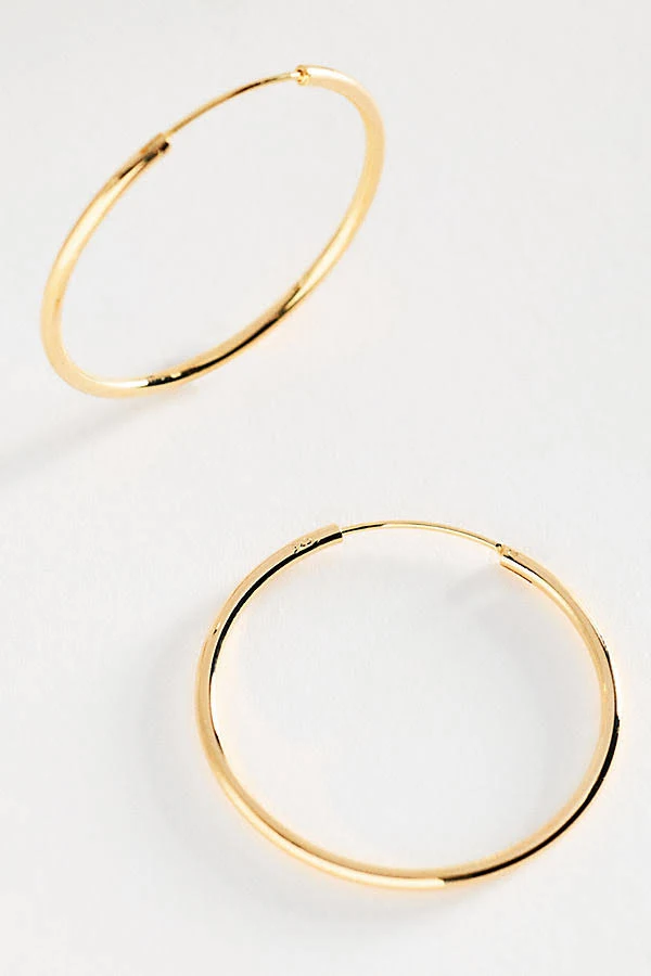 accessory Anthropologie Delicate Gilded Hoop Earrings Anthropologie $38